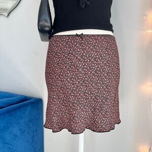 Brandy Melville black + floral skirt